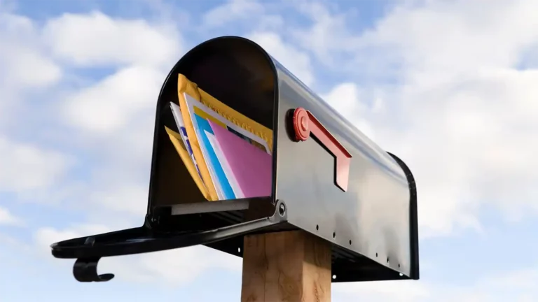 mailbox with direct mail and transactional mail printed and mailed by PMSI